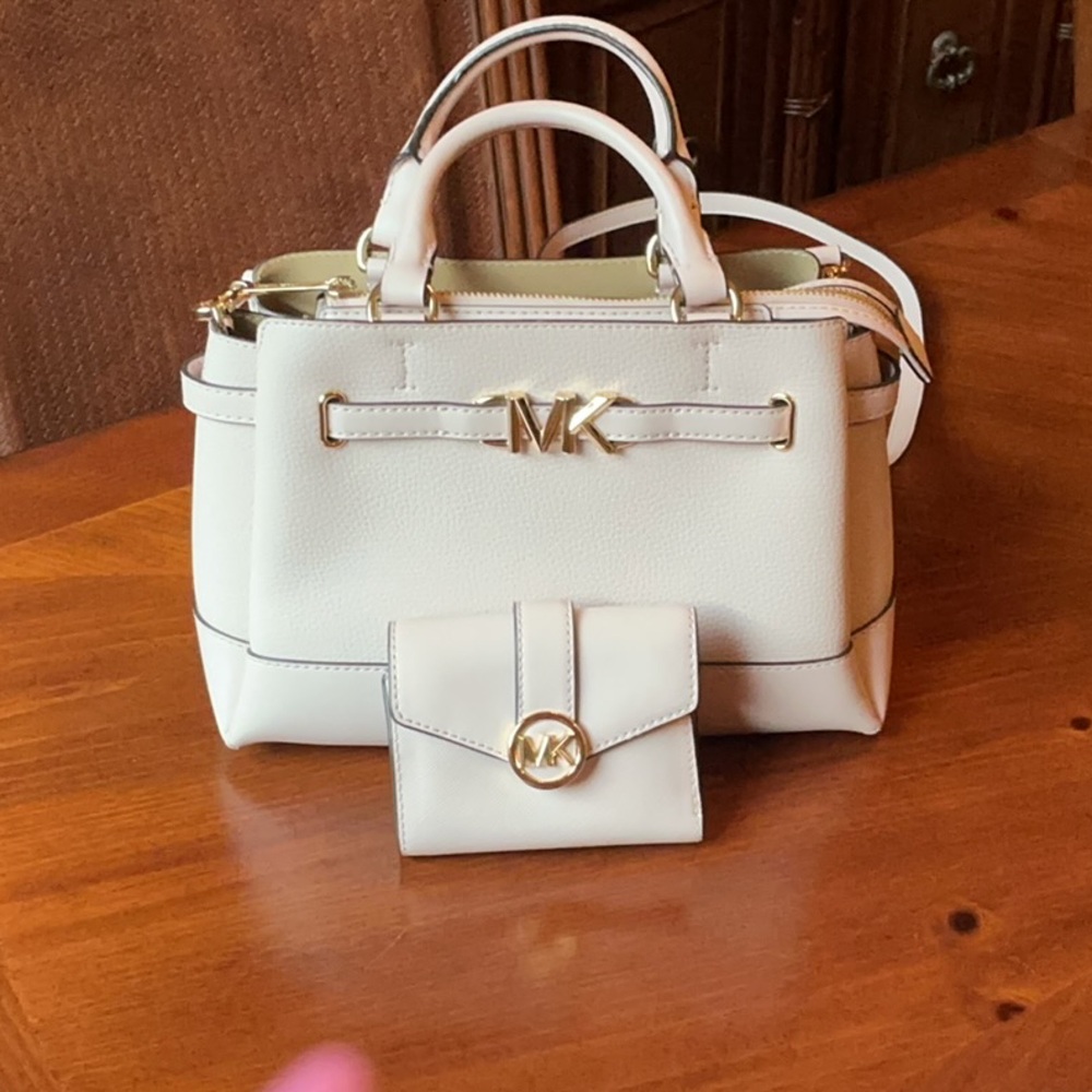 Michael Kors   Pink Satchel with Gold Hardware and wallet.